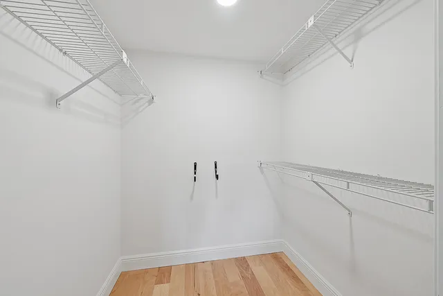 a view of a room with racks on the wall