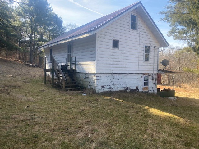 86 Ritz Farm Road Emlenton, PA 16373 - Photo 3 of 4 a view of a house with backyard and sitting area