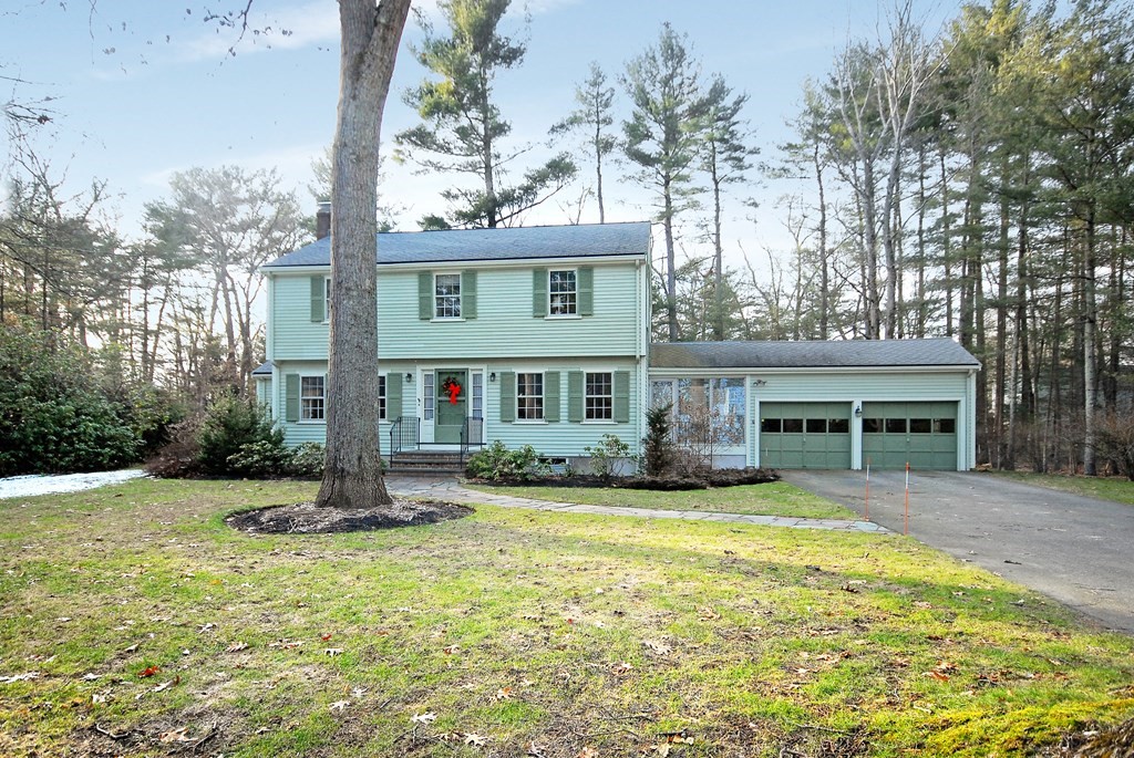48 Wilson Road Concord, MA 01742 - Photo 2 of 41 a view of a house with a yard patio and fire pit