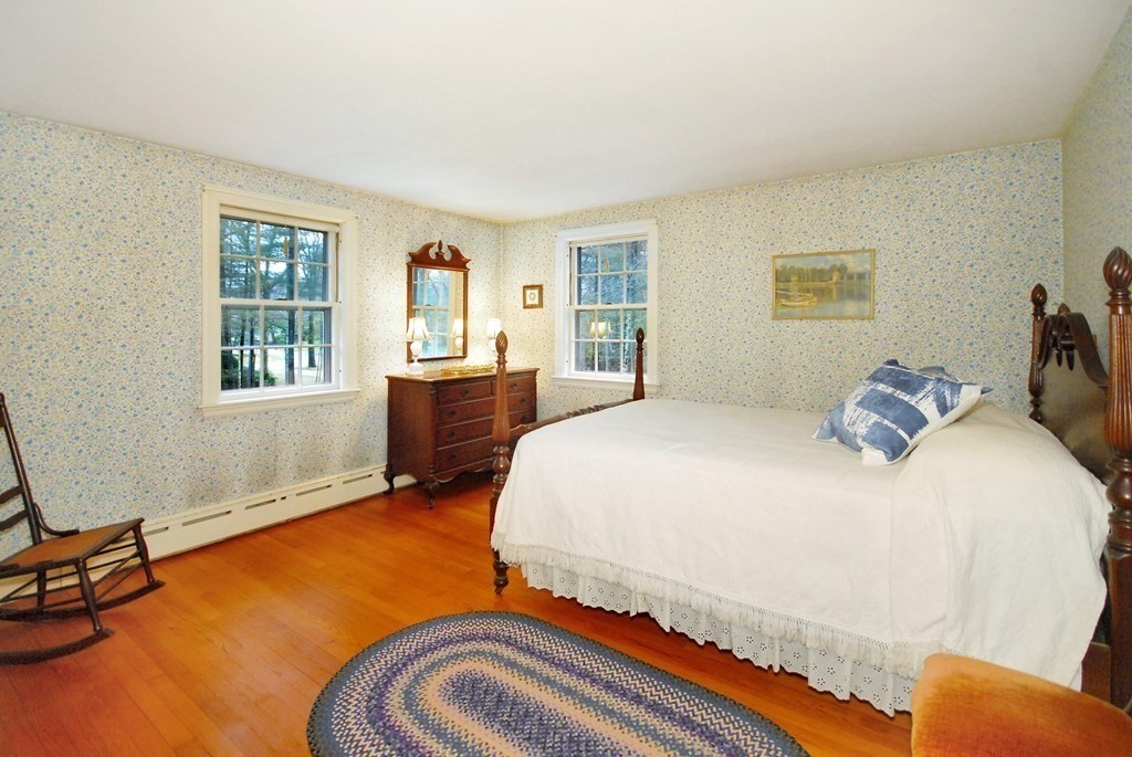 48 Wilson Road Concord, MA 01742 - Photo 23 of 41 a bedroom with a bed and window