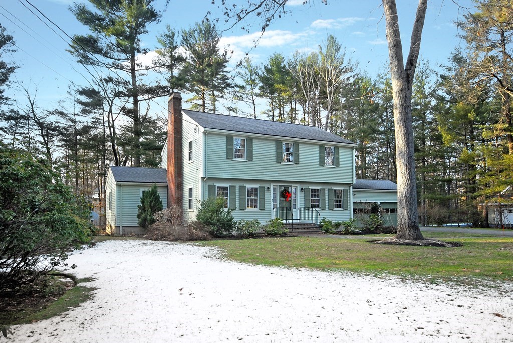 48 Wilson Road Concord, MA 01742 - Photo 3 of 41 front view of a house next to a yard