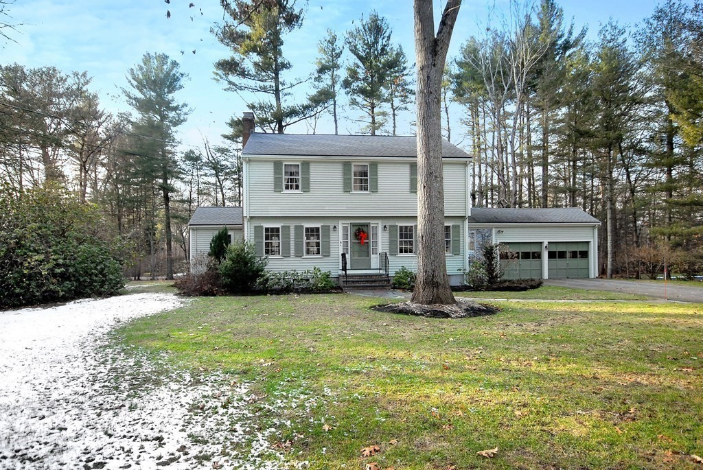 48 Wilson Road Concord, MA 01742 - Photo 38 of 41 a front view of a house with garden