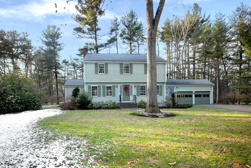 48 Wilson Road Concord, MA 01742 - Photo 5 of 41 a view of a house with garden and trees