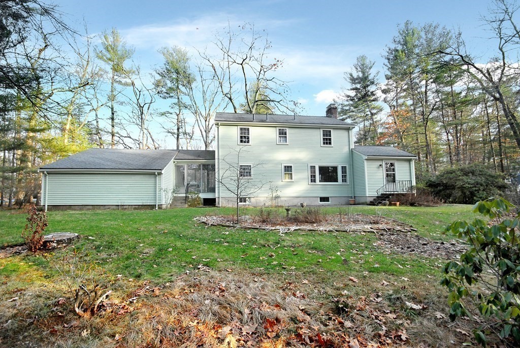 48 Wilson Road Concord, MA 01742 - Photo 6 of 41 a view of a house with a back yard