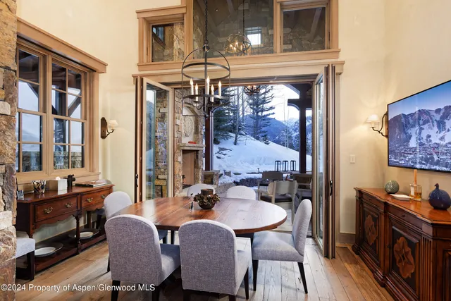 a living room with furniture and white walls