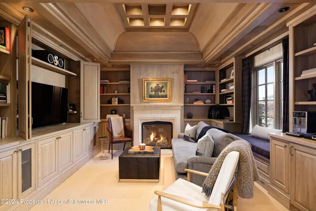 a spacious bathroom with a tub sink and mirror