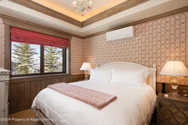 a view of a patio with table and chairs and couches