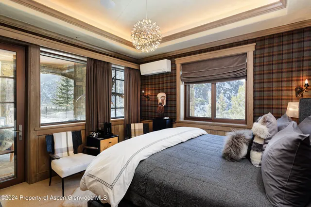 a view of a chairs and table in the patio