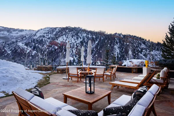 a view of a backyard with a patio