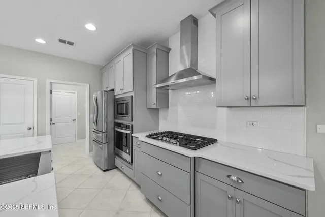 a bathroom with a sink double vanity and a mirror