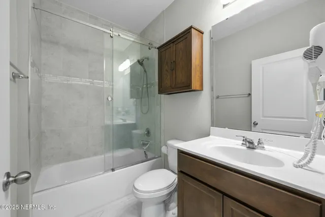 a view of a backyard with a lake view