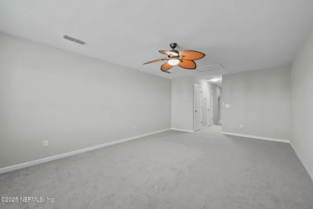 an aerial view of a water and trees