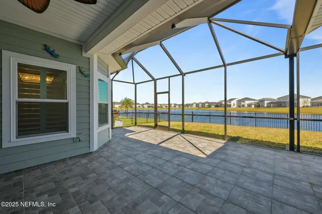 a view of a swimming pool with a lake view and mountain view