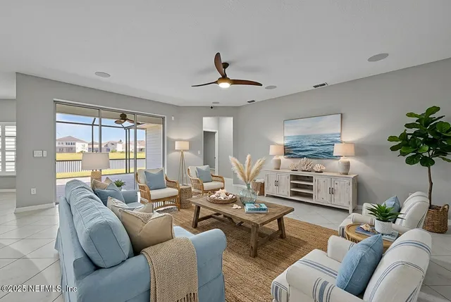 a dining room with furniture a chandelier and window