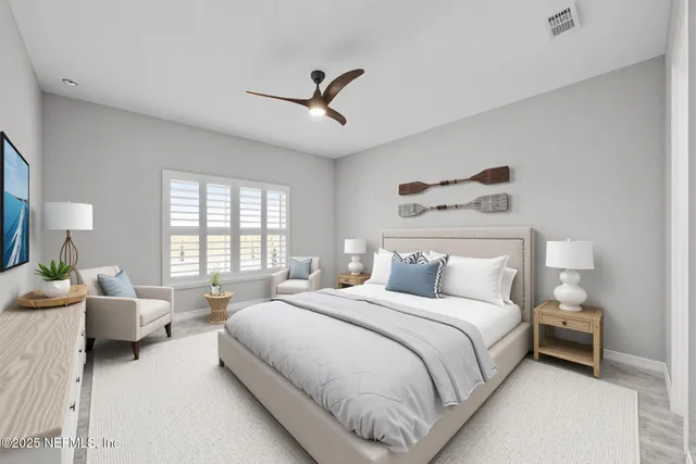 a view of a bathroom sink mirror and a shower