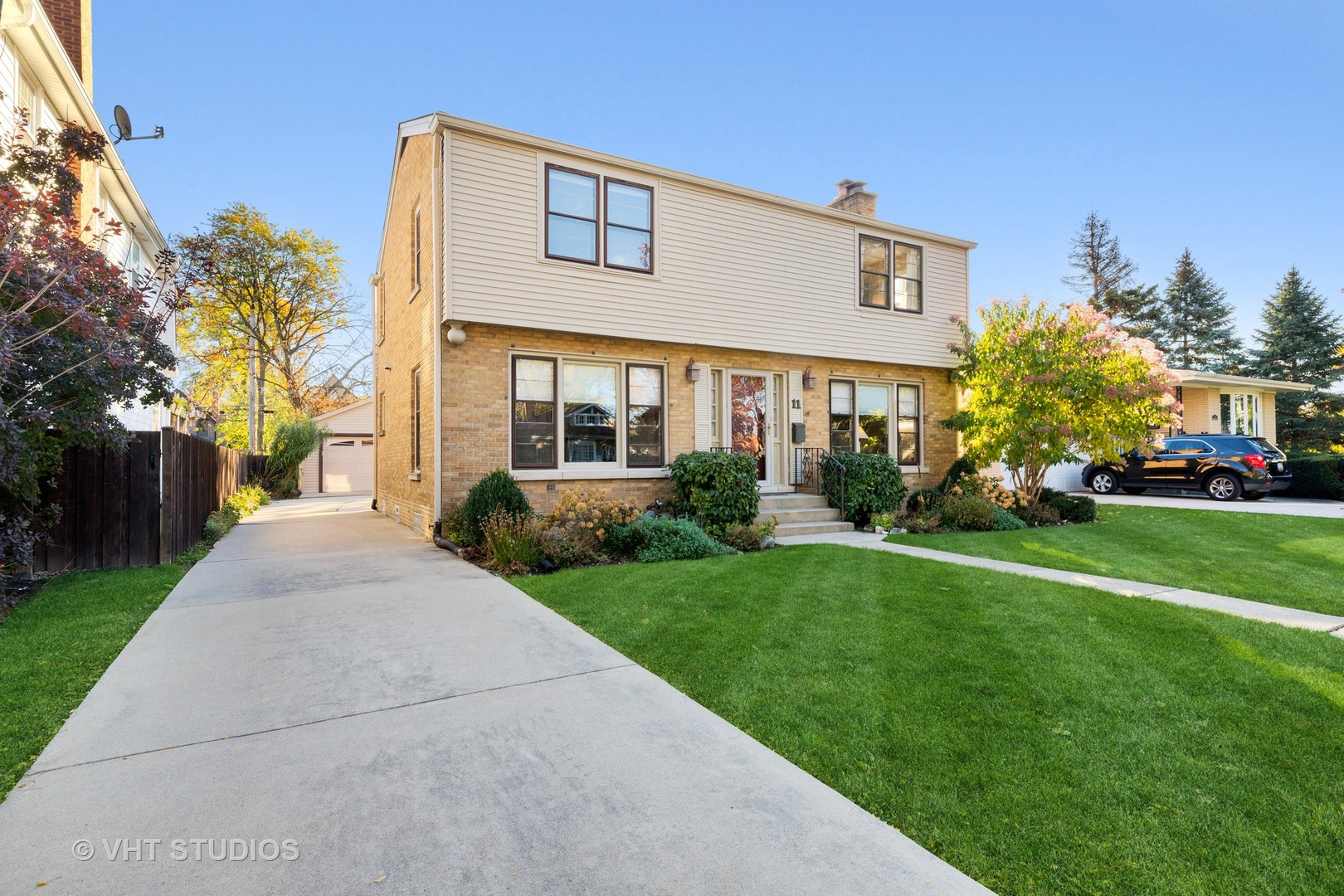 11 Elmore Street Park Ridge, IL 60068 - Photo 1 of 20 a front view of house with yard and green space