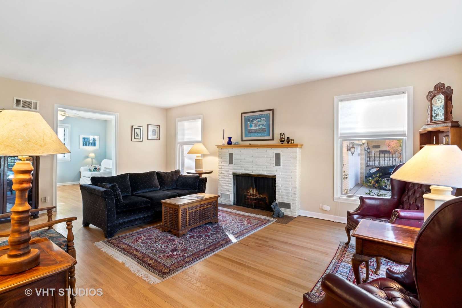 11 Elmore Street Park Ridge, IL 60068 - Photo 2 of 20 a living room with furniture and a fireplace