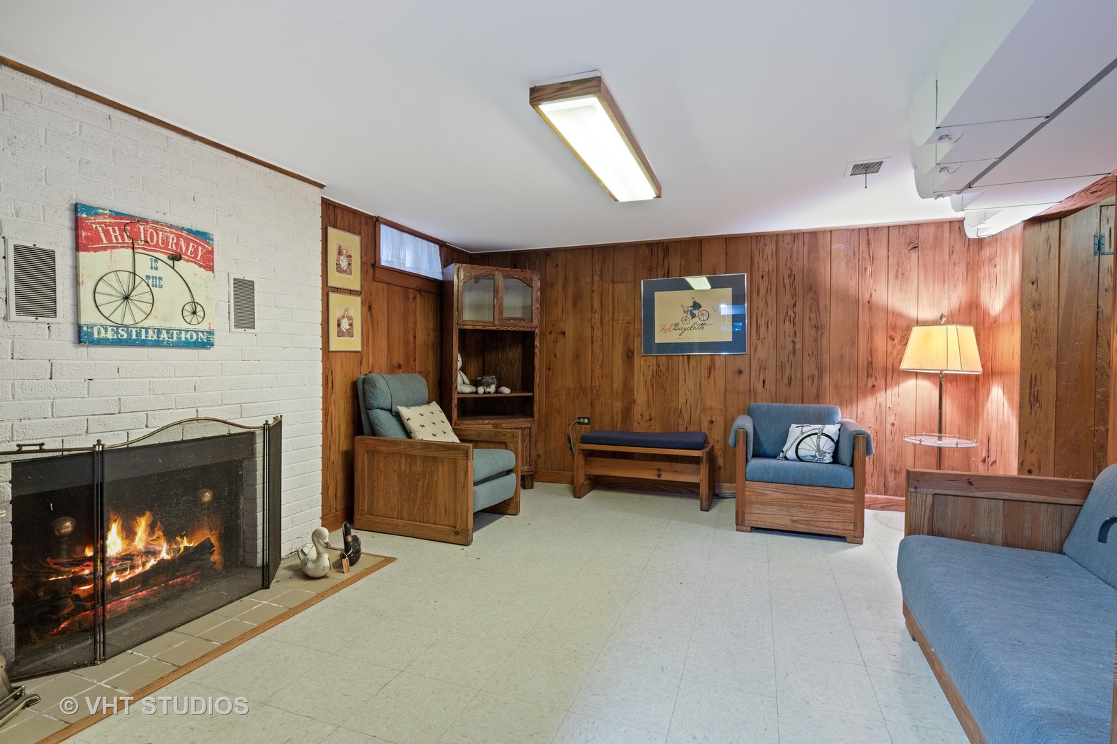 11 Elmore Street Park Ridge, IL 60068 - Photo 15 of 20 a living room with furniture and a fireplace