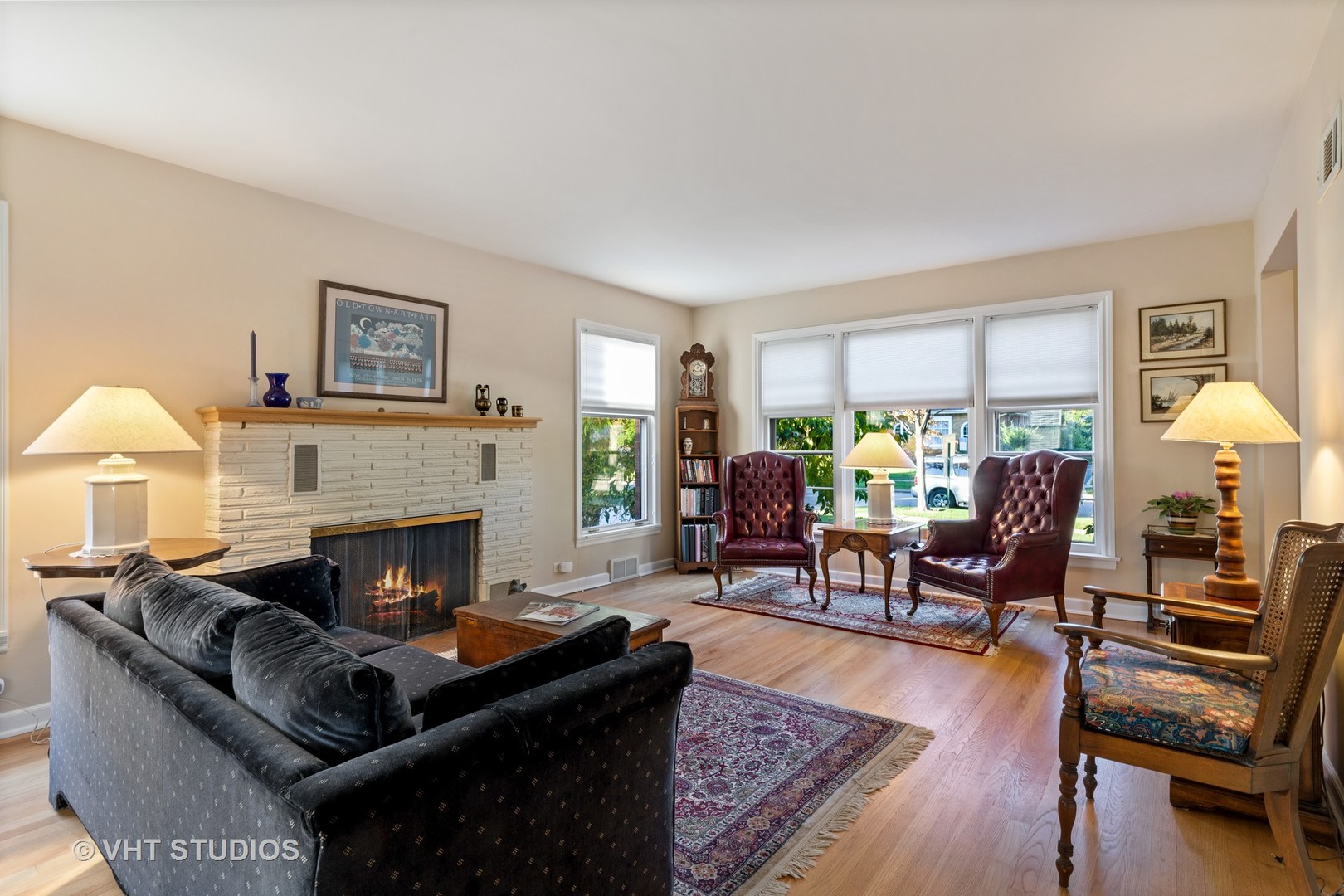 11 Elmore Street Park Ridge, IL 60068 - Photo 3 of 20 a living room with furniture and a fireplace