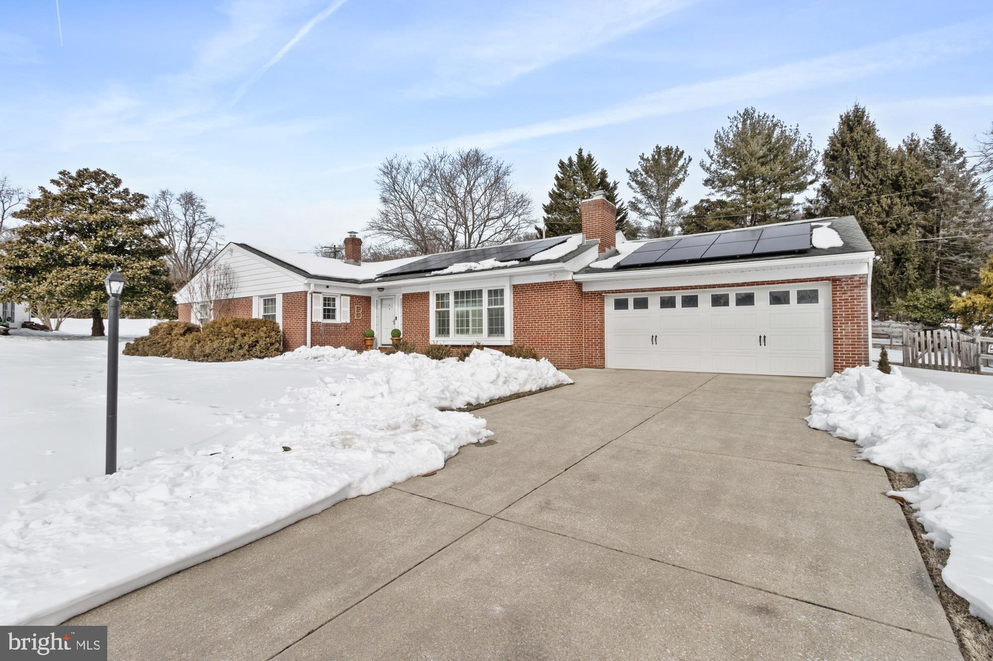 1002 Dunblane Road Towson, MD 21286 - Photo 2 of 59 a view of a white house with a yard