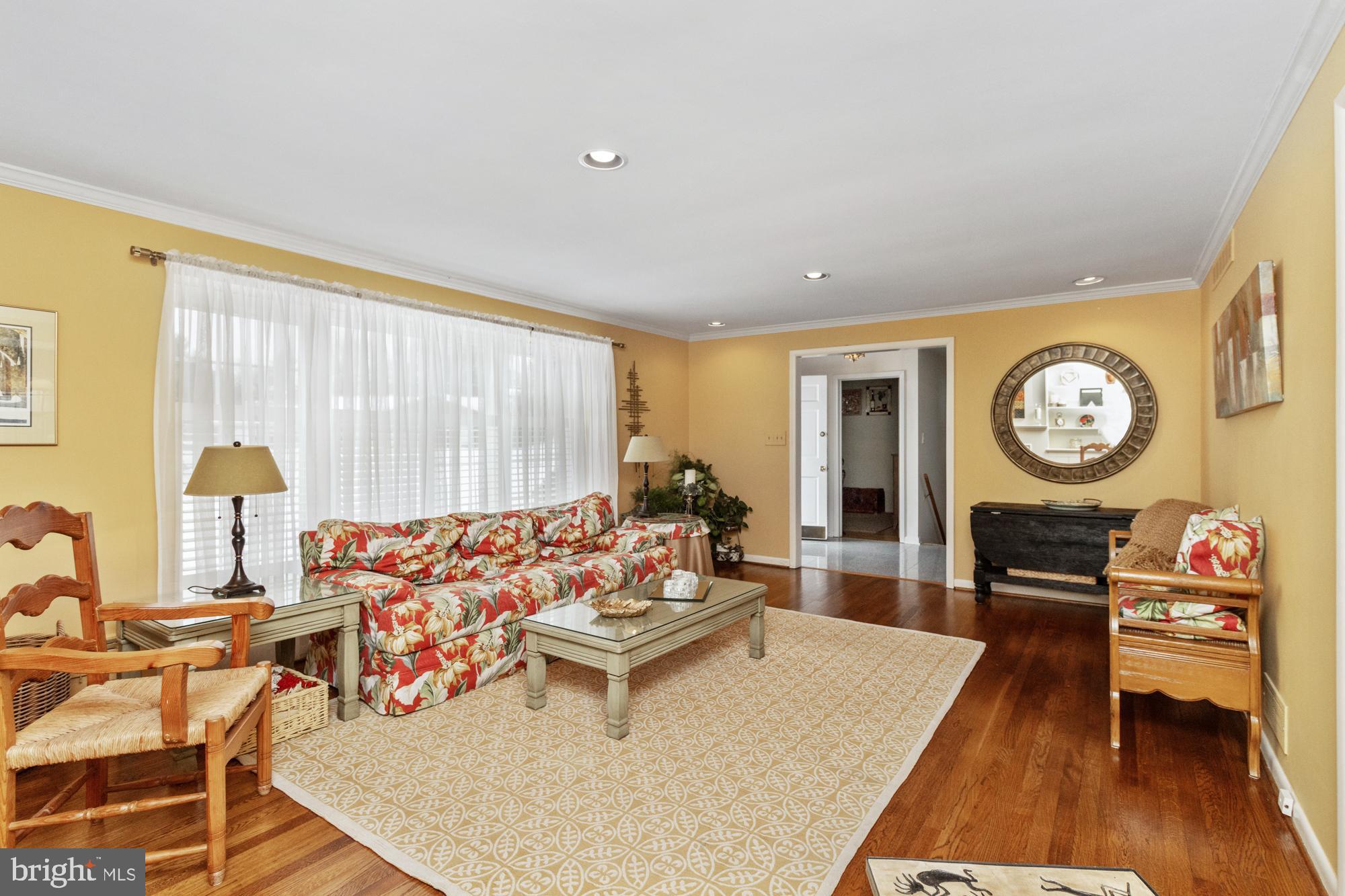 1002 Dunblane Road Towson, MD 21286 - Photo 21 of 59 a living room with furniture a rug and a large window