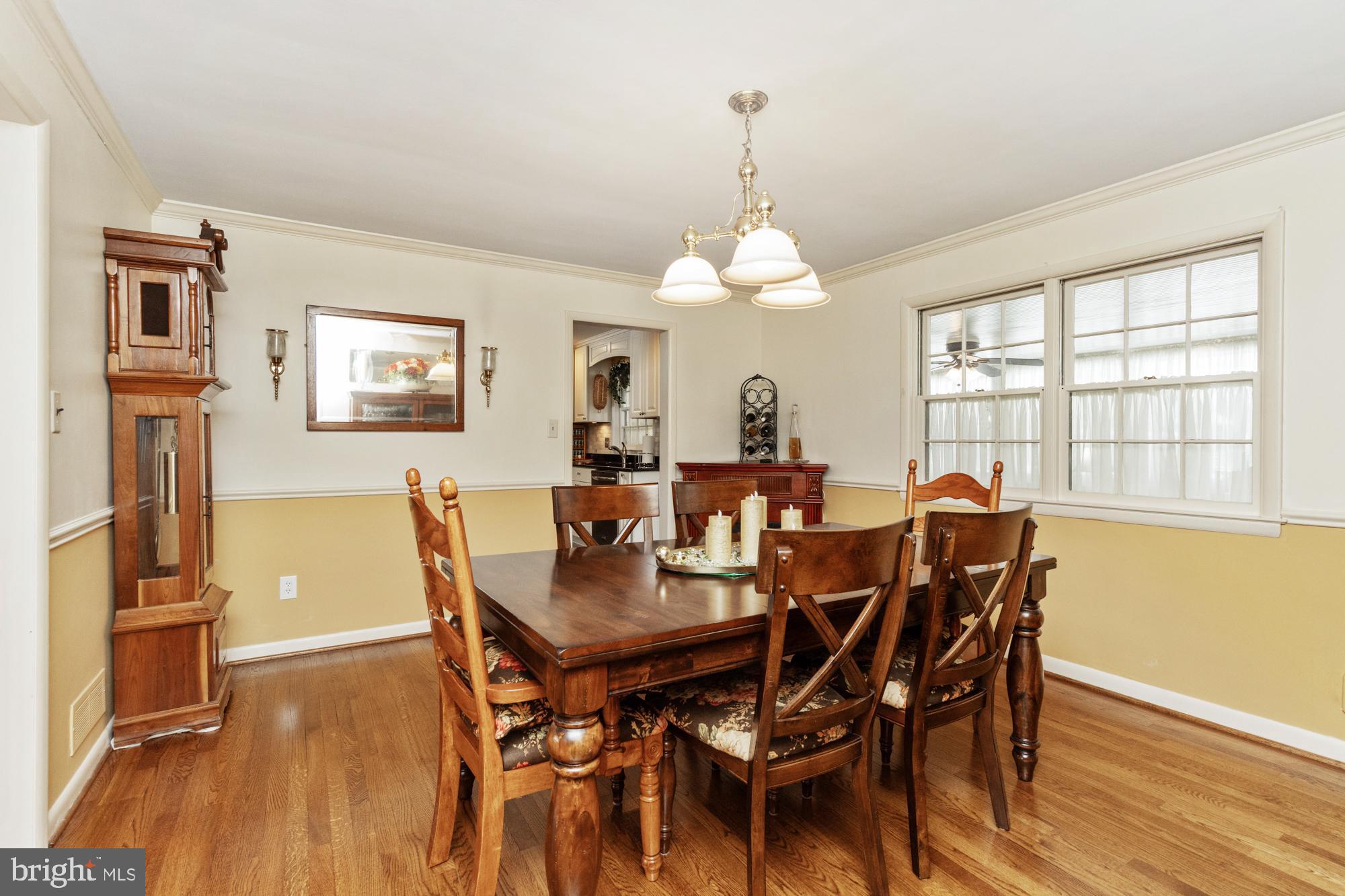 1002 Dunblane Road Towson, MD 21286 - Photo 22 of 59 a view of a dining room with furniture window and wooden floor