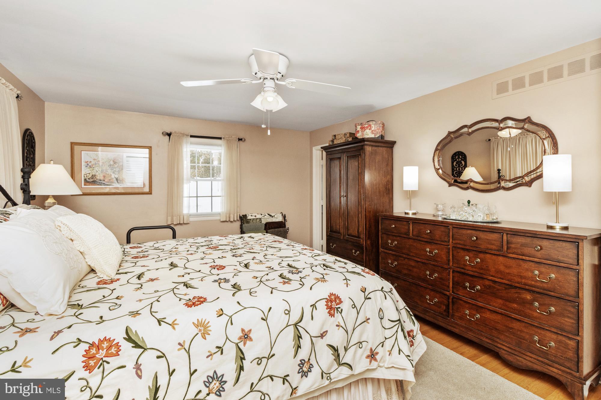 1002 Dunblane Road Towson, MD 21286 - Photo 33 of 59 a bedroom with a bed and a dresser