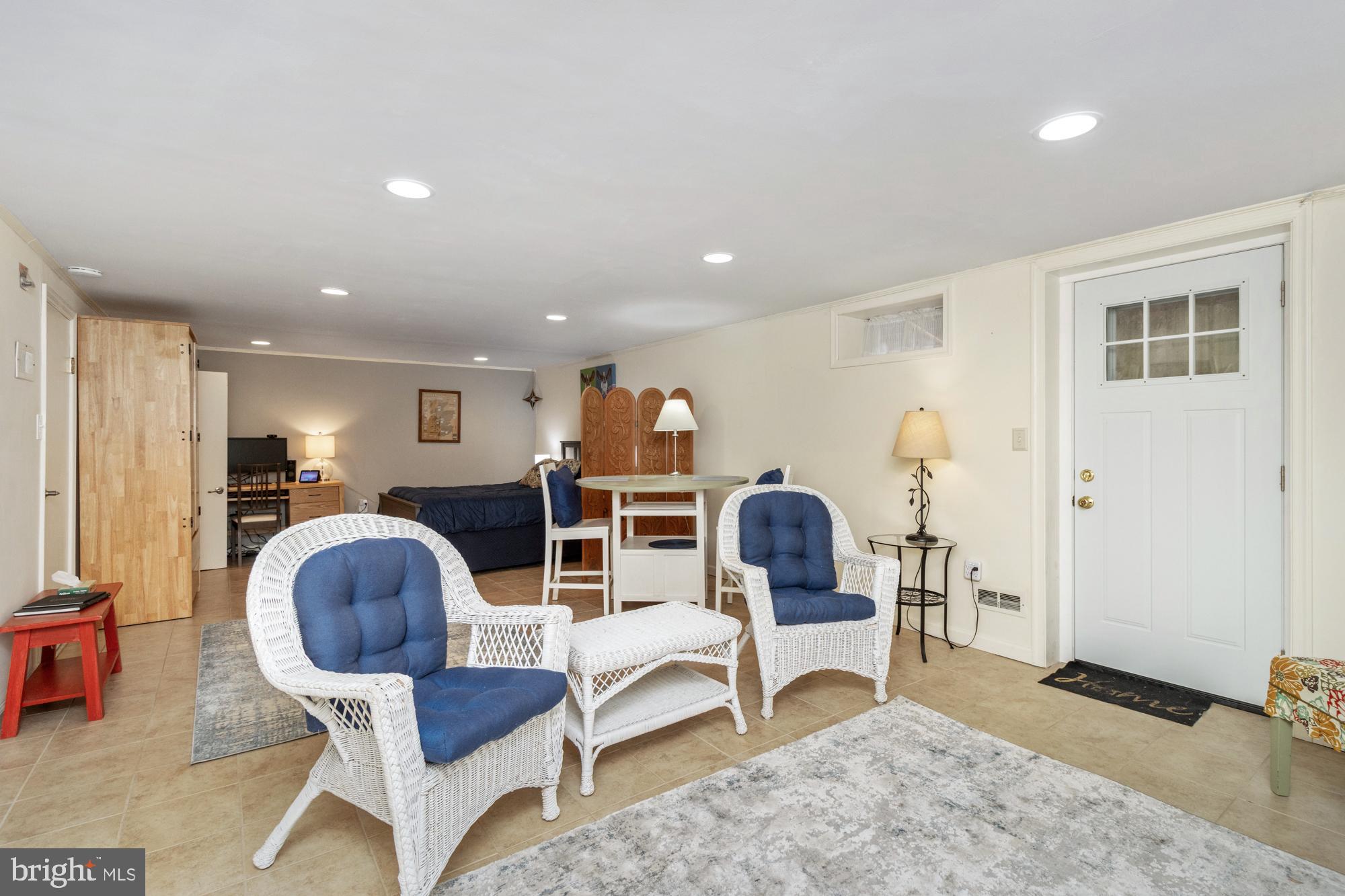 1002 Dunblane Road Towson, MD 21286 - Photo 46 of 59 a living room with furniture and a window