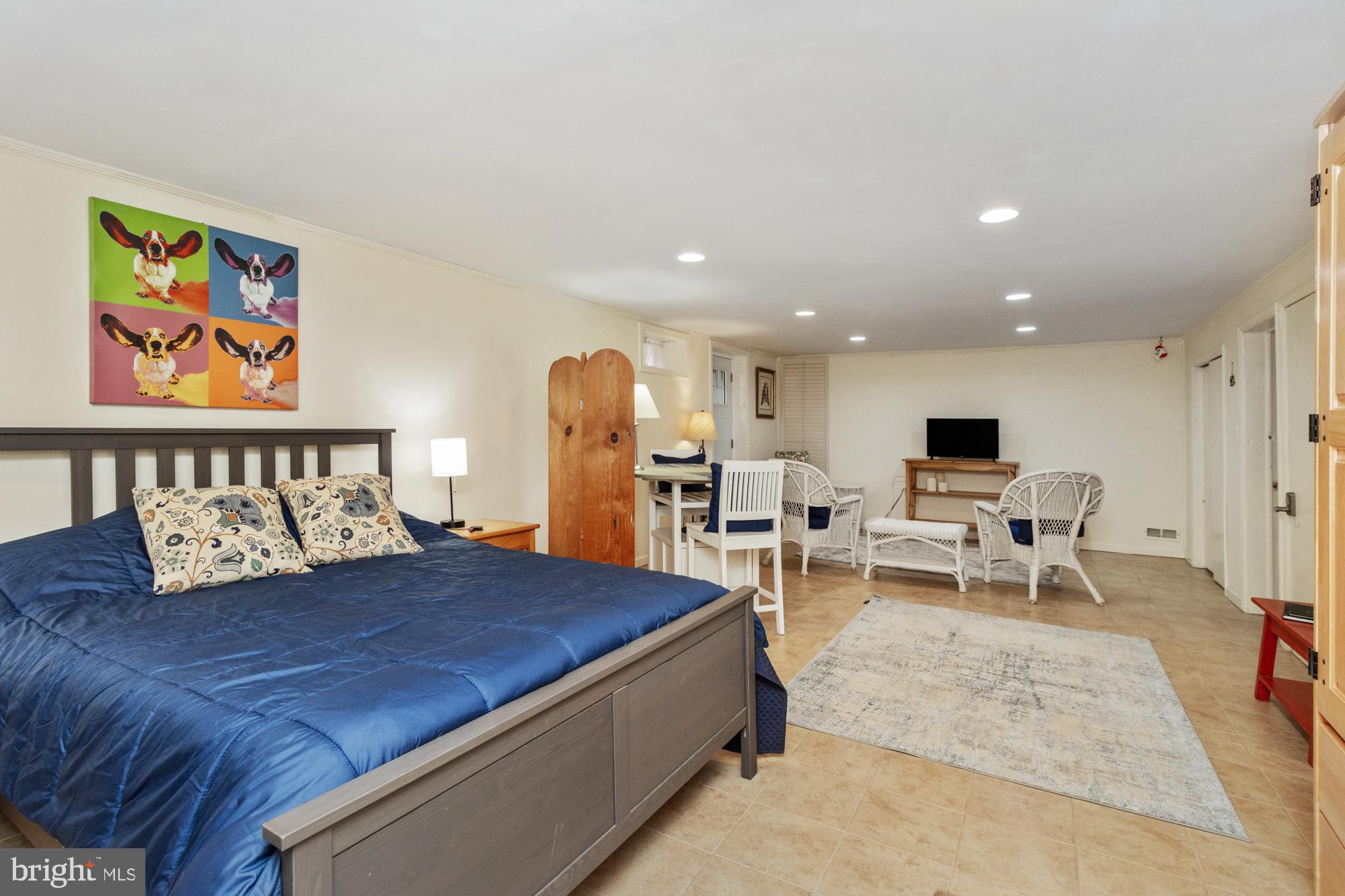 1002 Dunblane Road Towson, MD 21286 - Photo 50 of 59 a living room with furniture a rug and wall painting
