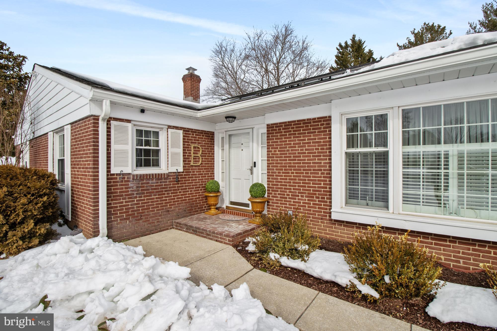 1002 Dunblane Road Towson, MD 21286 - Photo 5 of 59 a front view of a house with outdoor seating
