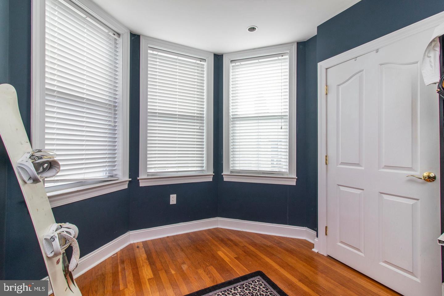 317-19 Rector Street Philadelphia, PA 19128 - Photo 19 of 29 a bedroom with a bed and a window