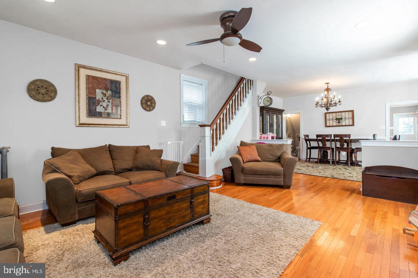 317-19 Rector Street Philadelphia, PA 19128 - Photo 6 of 29 a living room with furniture and a view of kitchen