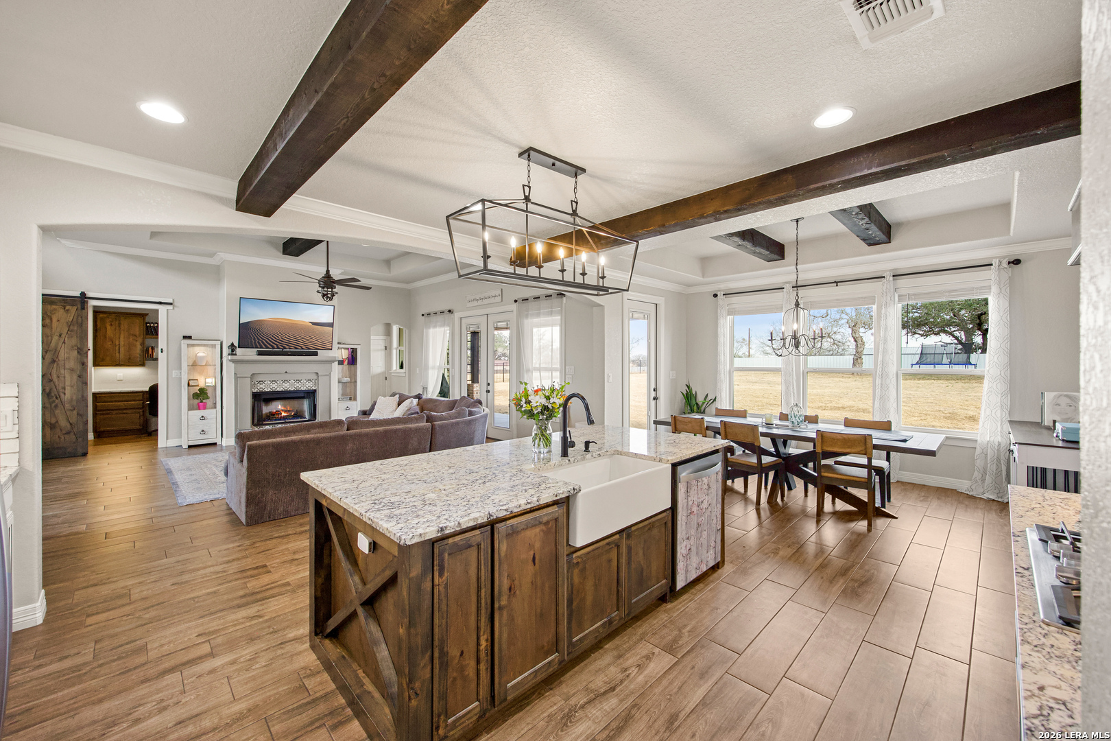 121 Western Way Adkins, TX 78101 - Photo 21 of 46 a large kitchen with a table and chairs