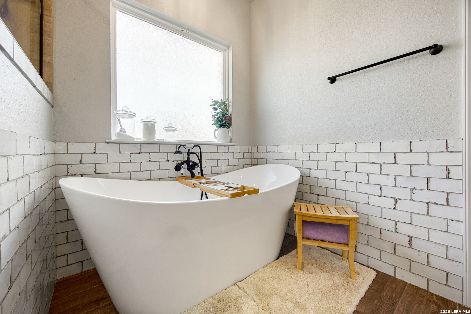 121 Western Way Adkins, TX 78101 - Photo 28 of 46 a view of a bathtub in a bathroom