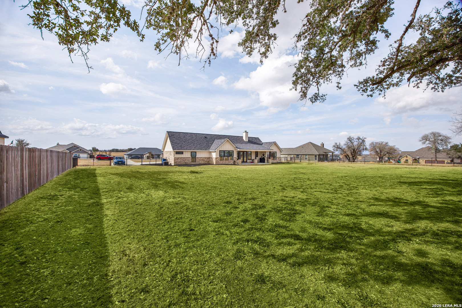 121 Western Way Adkins, TX 78101 - Photo 42 of 46 a large green field with lots of bushes