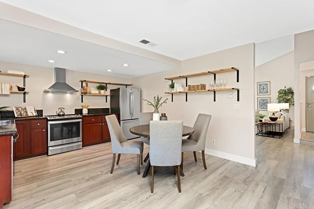 1081 Tylee Street Vista, CA 92083 - Photo 11 of 26 a view of kitchen with sink and wooden floor