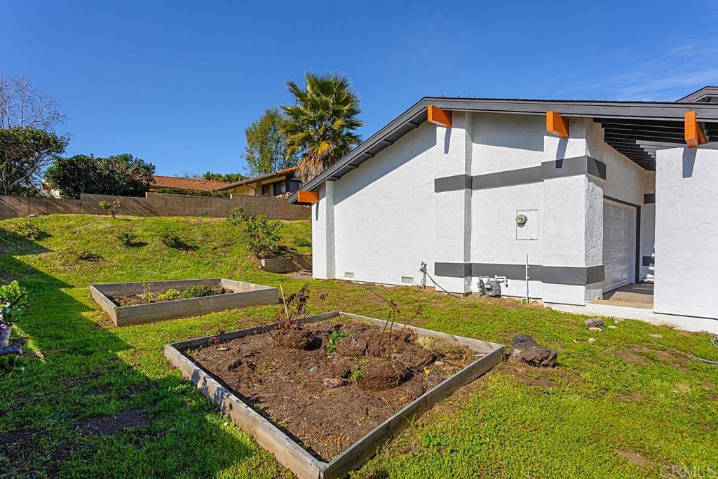 1081 Tylee Street Vista, CA 92083 - Photo 26 of 26 a front view of house with yard