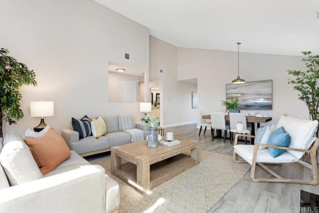 1081 Tylee Street Vista, CA 92083 - Photo 6 of 26 a living room with furniture and a table