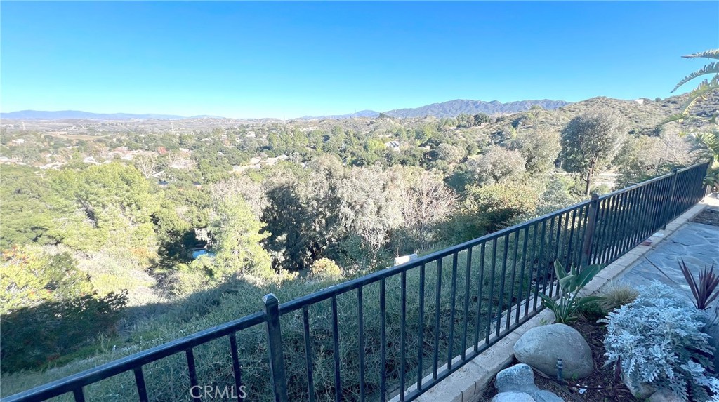 24394 Crestview Drive Newhall, CA 91321 - Photo 12 of 38 a view of a mountain from a balcony