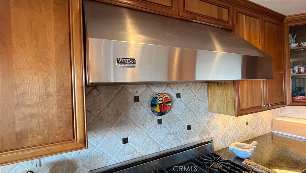 24394 Crestview Drive Newhall, CA 91321 - Photo 16 of 38 a bathroom with a sink and a shower curtain
