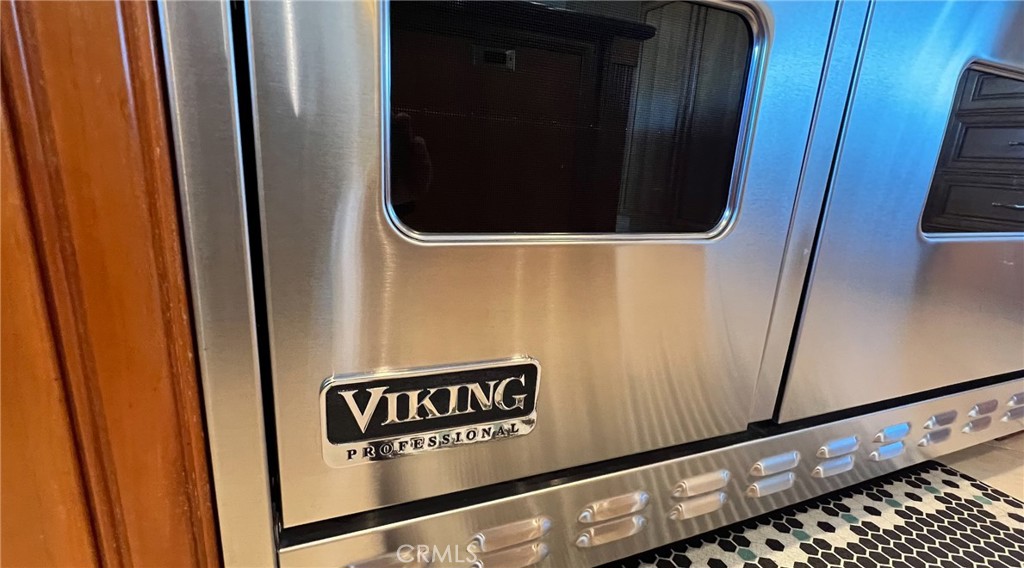 24394 Crestview Drive Newhall, CA 91321 - Photo 17 of 38 a close view of a sink and refrigerator