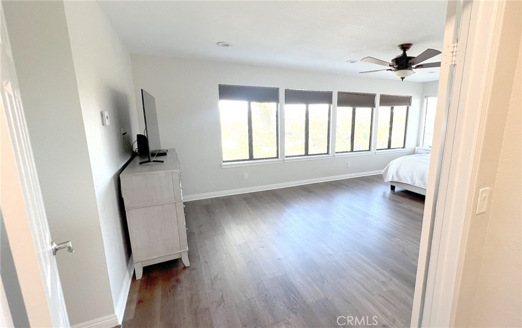 24394 Crestview Drive Newhall, CA 91321 - Photo 30 of 38 wooden floor in an empty room with a window