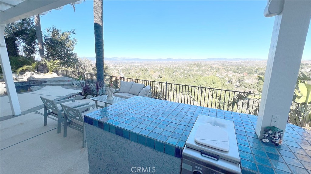 24394 Crestview Drive Newhall, CA 91321 - Photo 10 of 38 a view of a patio with wooden floor