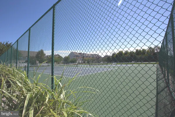 a front view of a house with yard