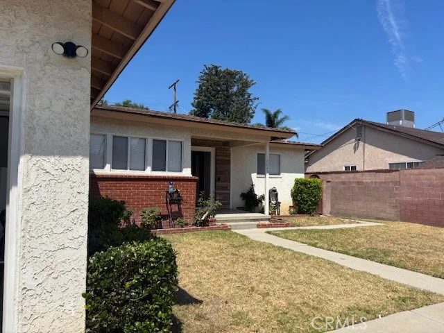 front view of a house with a patio