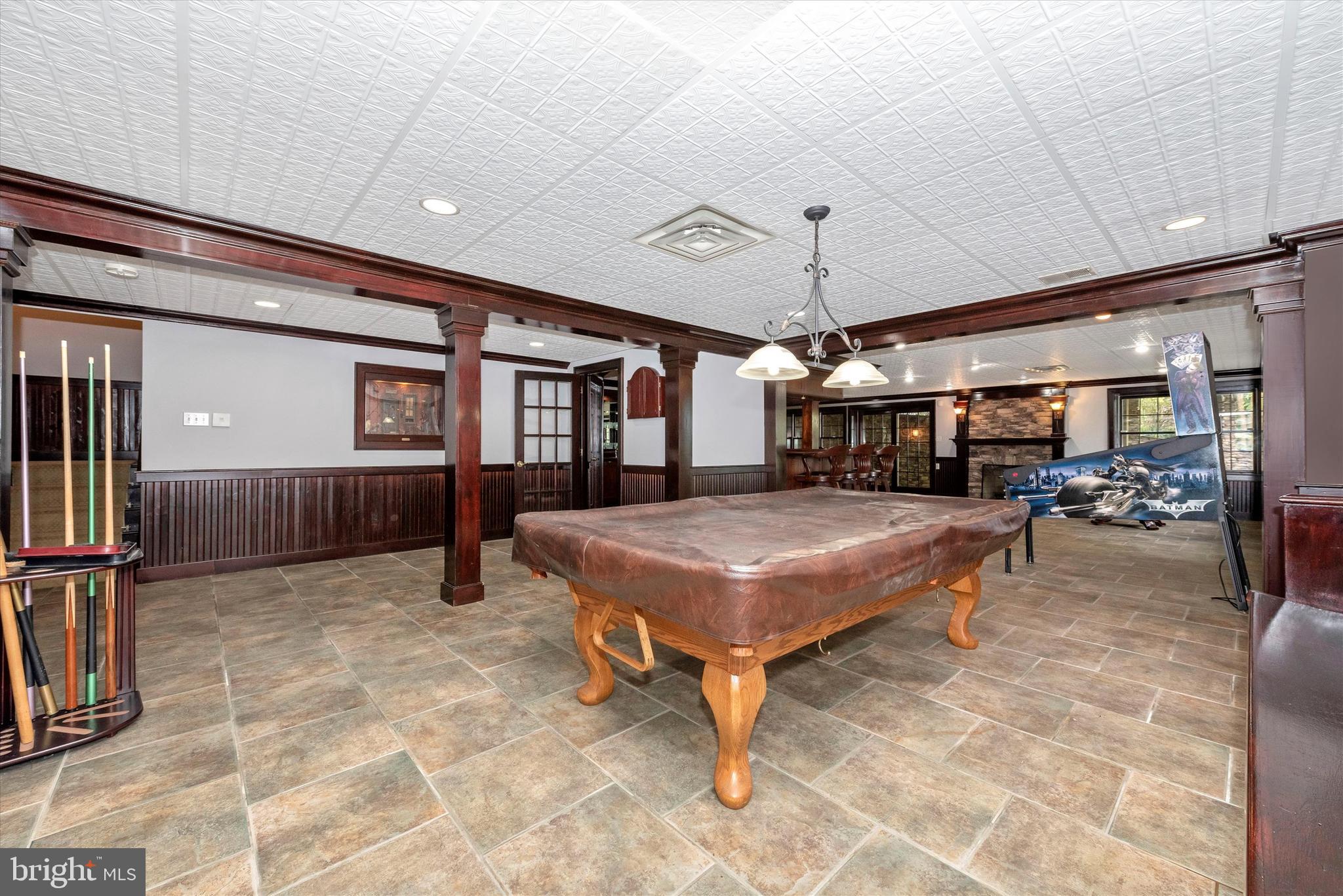 8310 Edgewood Church Road Frederick, MD 21702 - Photo 68 of 107 basement game area/pool table