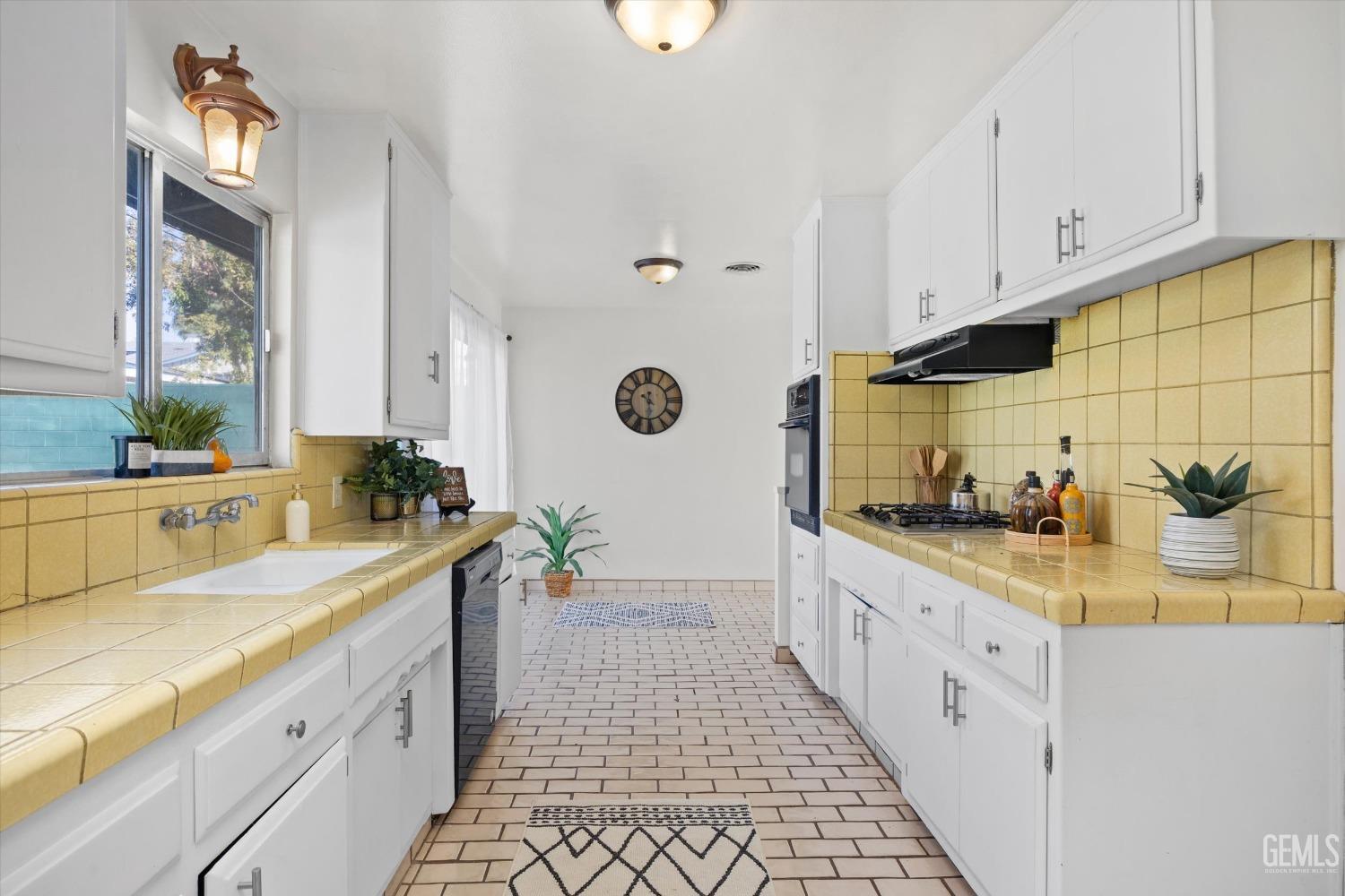 Undisclosed Address Bakersfield, CA 93306 - Photo 7 of 25 Galley kitchen w/tons of storage and counter top
