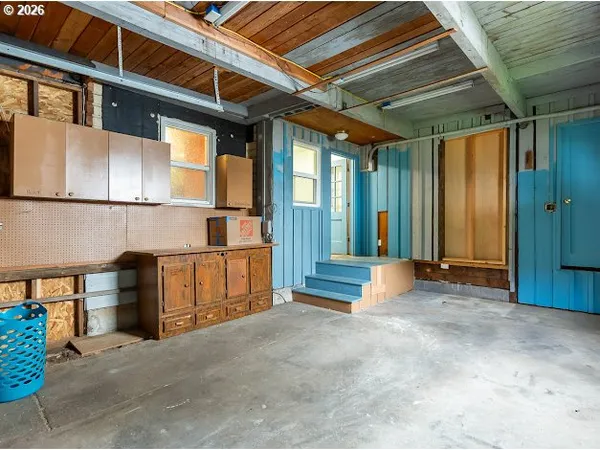 a view of front door with outdoor seating
