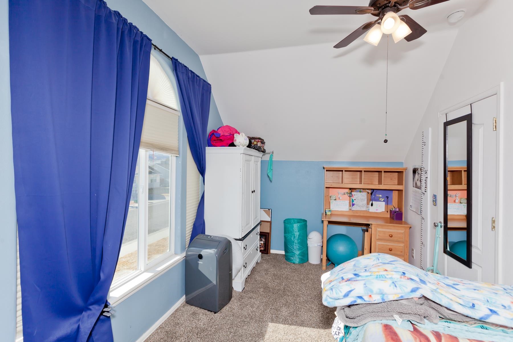 173 Sierra Drive Fruita, CO 81521 - Photo 32 of 40 a living room with furniture and a window