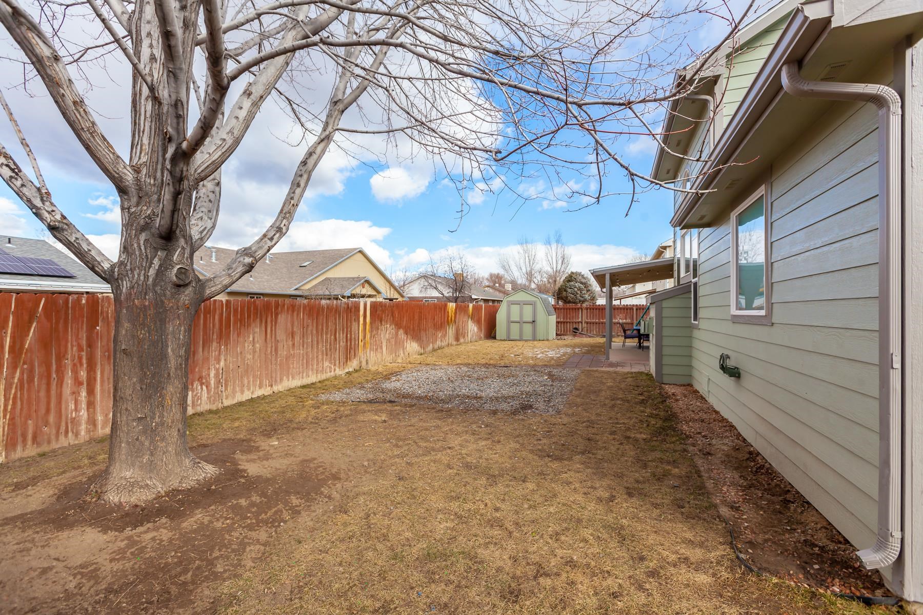 173 Sierra Drive Fruita, CO 81521 - Photo 36 of 40 a view of a backyard of the house